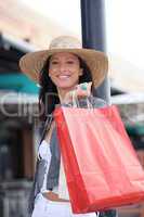 portrait of a woman with shopping bags