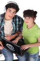 Teens with computer