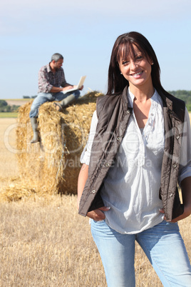 happy couple in their farm