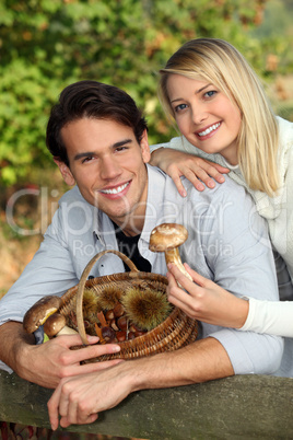 Couple picking mushrooms