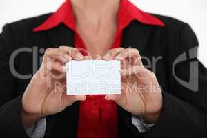 woman holding a business card