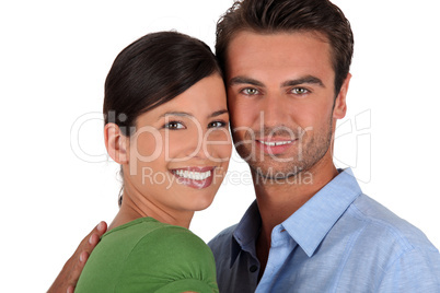 Couple stood with faces touching