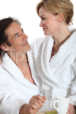 Couple wearing dressing gowns