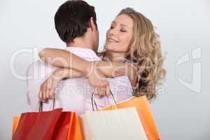 Couple with shopping bags