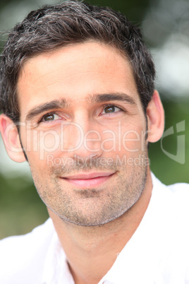 Close-up of dark haired man