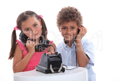 Children playing on the phone