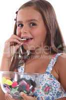 Girl eating sweets