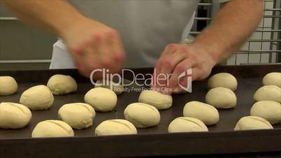 german bakery roll dough cut into dolly 10727