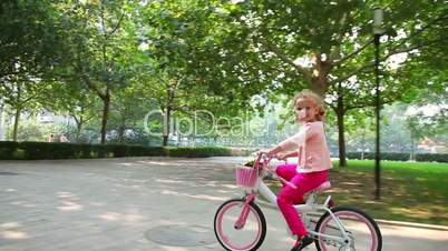 Little girl on bike