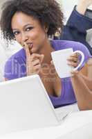 Mixed Race African American Girl Using Laptop Computer