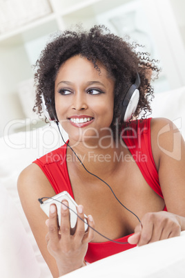 African American Girl Listening to MP3 Player Headphones