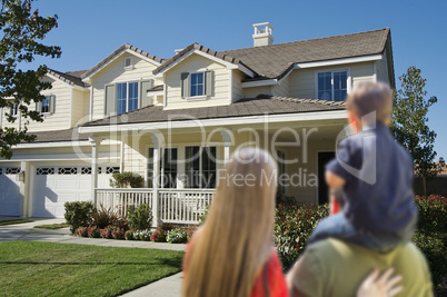 Young Family Looking at a New Home