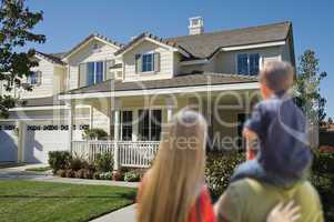 Young Family Looking at a New Home