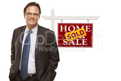 Businessman and Sold Home For Sale Real Estate Sign Isolated