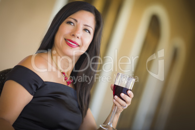 Attractive Hispanic Woman Portrait Outside Enjoying Wine