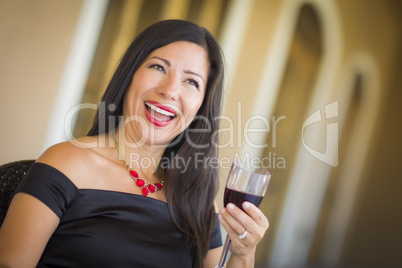 Attractive Hispanic Woman Portrait Outside Enjoying Wine