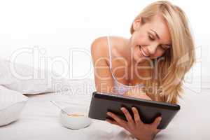 blonde using tablet