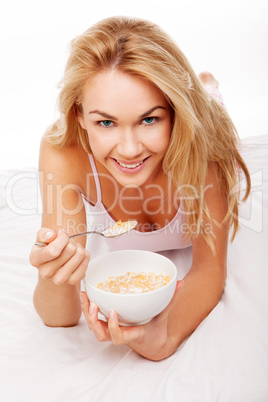 blonde woman on bed