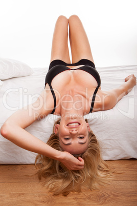 blonde woman on bed