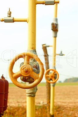 Natural gas station among field