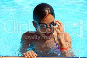 Teen girl in swimming pool portrait