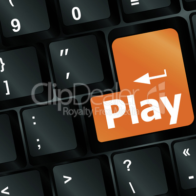 Computer keyboard with Play key - technology background