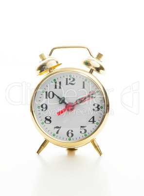 Golden retro style alarm clock
