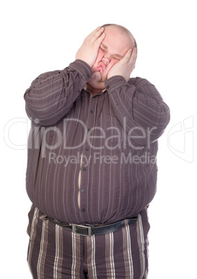 Obese man squashing his face