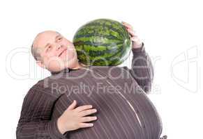 Obese man carrying a watermelon