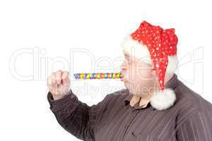 Cheerful fat man in Santa hat