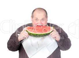 Obese man eating watermelon