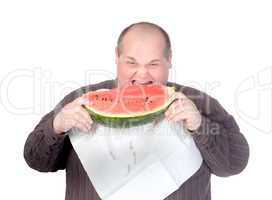 Obese man eating watermelon