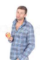 Handsome casual man eat apple