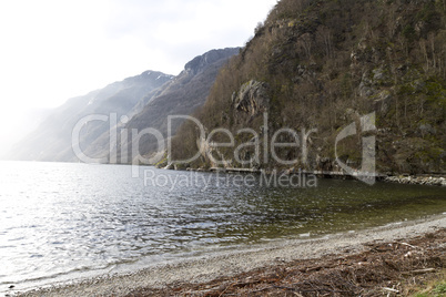 fjord in norway with pebbly coast