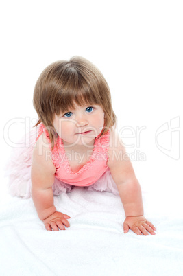 Isolated curious pretty girl child crawling