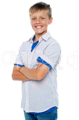 Confident young boy posing in casuals