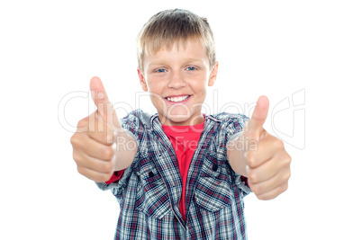 Student flashing double thumbs up