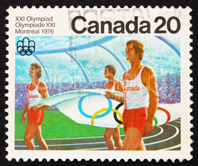 Postage stamp Canada 1976 Canadian Athletes carrying Olympic Fla