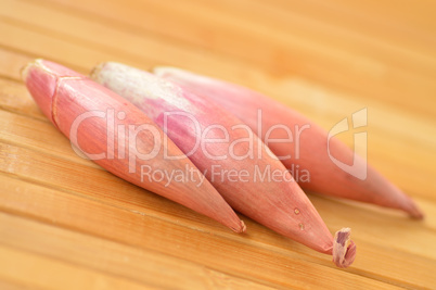 Shallot onions on a background of the boards