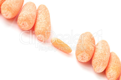 Baby carrots on a white background