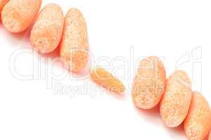 Baby carrots on a white background
