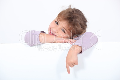Little girl with blank poster