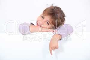Little girl with blank poster