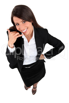 Young businesswoman mobile telephone gesture with hand