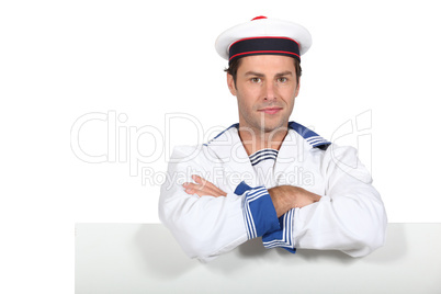 Man in navy costume