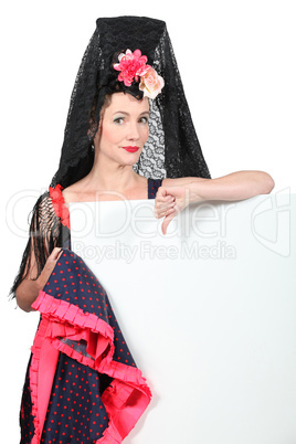 Woman wearing traditional Spanish dancer outfit
