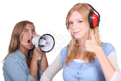 Girl shouting in loud speaker