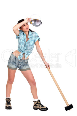 Sweating young woman with mace