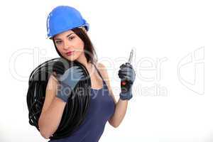 female electrician with coil of wire