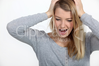 Stressed blond woman shouting